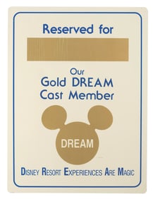 A Gold DREAM Cast Member Parking Sign.