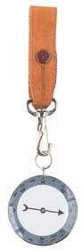 A Disneyland Compass with Leather Strap.