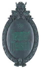 A Haunted Mansion Gate Plaque Replica.