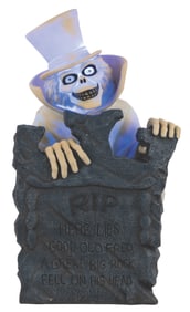 A Light-Up Hatbox Ghost Tombstone Figure.