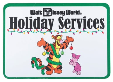 A Walt Disney World Holiday Services Sign.