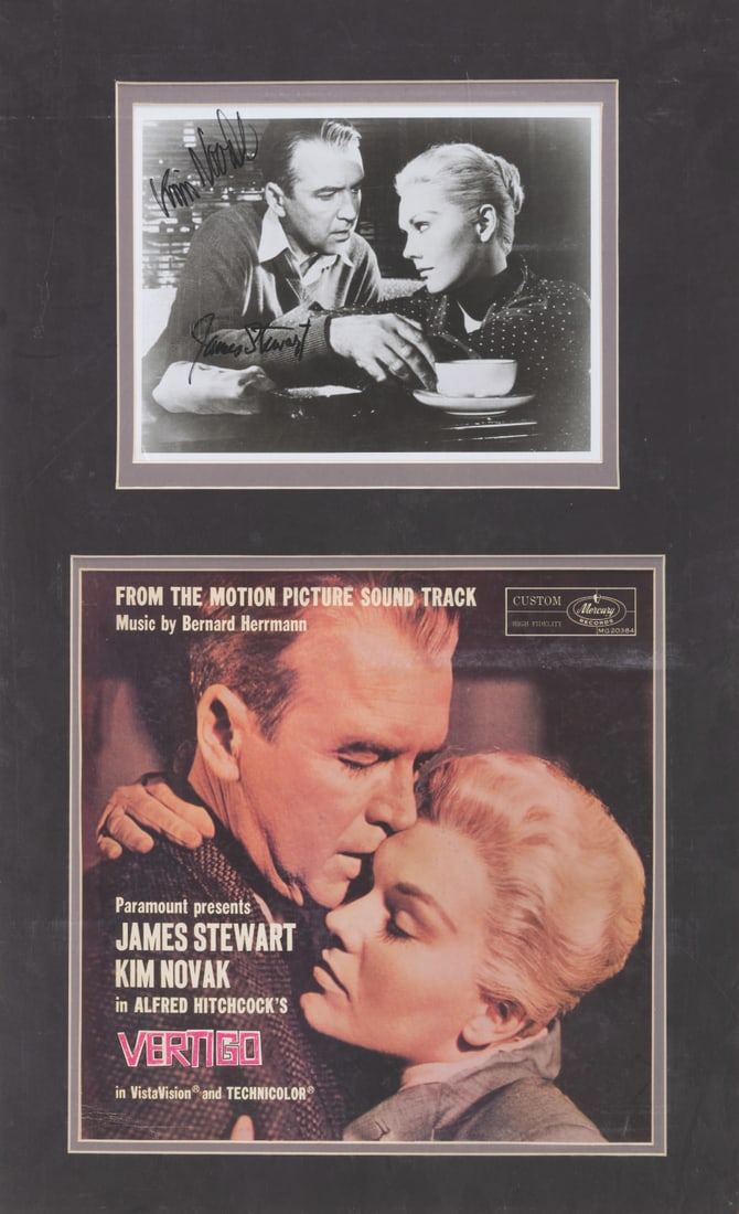 A Multi-Signed “Vertigo" Publicity Photo and Record Sleeve.: (Paramount/Mercury Records, 1958) A framed “Vertigo” record sleeve and publicity photo signed by James Stewart and Kim Novak. Alfred Hitchcock's classic film is often considered one of the bes