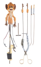 An "Adventures in Wonderland" Dormouse Puppet.