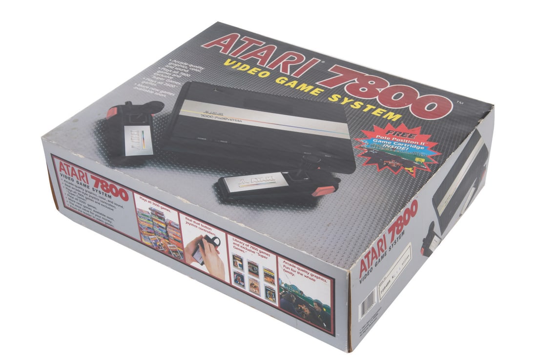 A Large Collection of Atari Video Game Systems and Games.: (Atari/Jakks Pacific, 1980-2002) A large collection of Atari video game consoles, accessories, and games. Included in the lot are an Atari 7800 ProSystem box set, Atari CX2600A, Atari 2600 Jr., Atari 