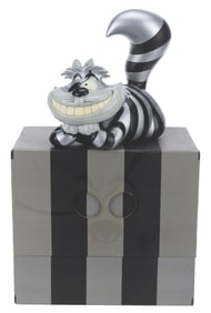 A Raiders Cheshire Cat Vinyl Figure.