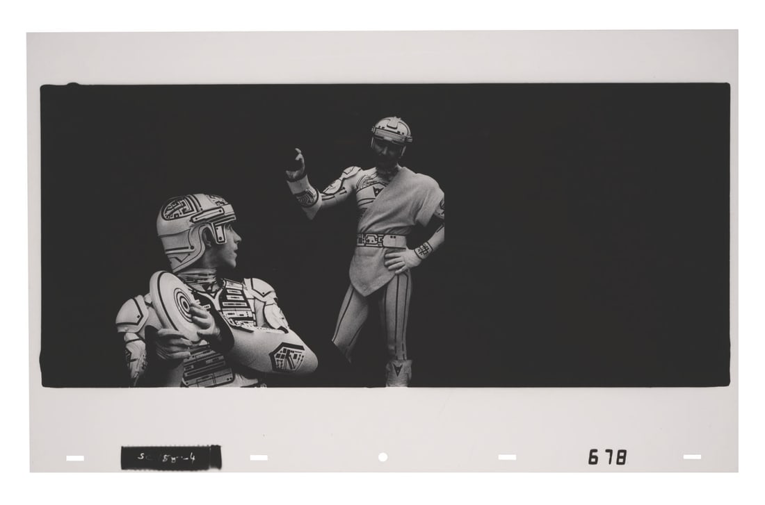 A "TRON" Ektachrome Transparency Cel.: (Disney, 1982) An original Ektachrome continuous tone transparency cel of Flynn and RAM from "TRON." Each frame of film was transferred to several transparencies so that special effects could be added