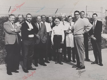 A Multi-Signed WED Imagineering Team Photo.