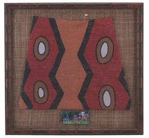 A Framed Jungle Cruise Native Fabric Swatch.