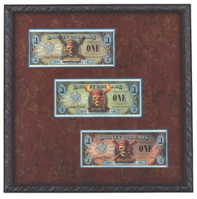 A Set of Pirates of the Caribbean Disney Dollars.