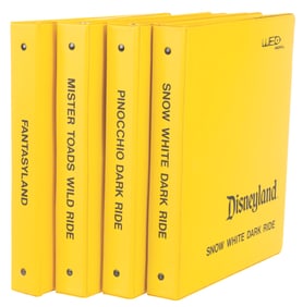 A Collection of WED Fantasyland Binders.