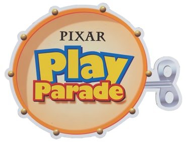 A Pixar Play Parade Hand Sign.