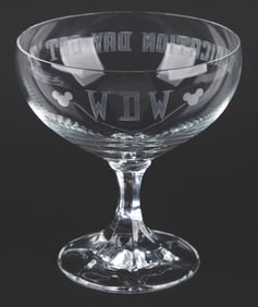 A Walt Disney World Grand Opening Dedication Day Champagne Glass.