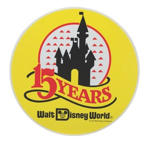 A Walt Disney World 15th Anniversary Sign.