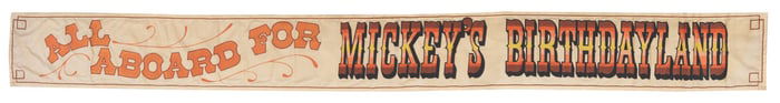 A Mickey’s Birthdayland Frontierland Train Station Banner.