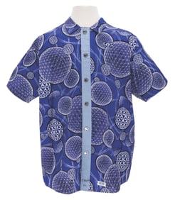 An EPCOT Center Park Greeter Shirt.