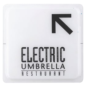 An Epcot Electric Umbrella Directional Sign.