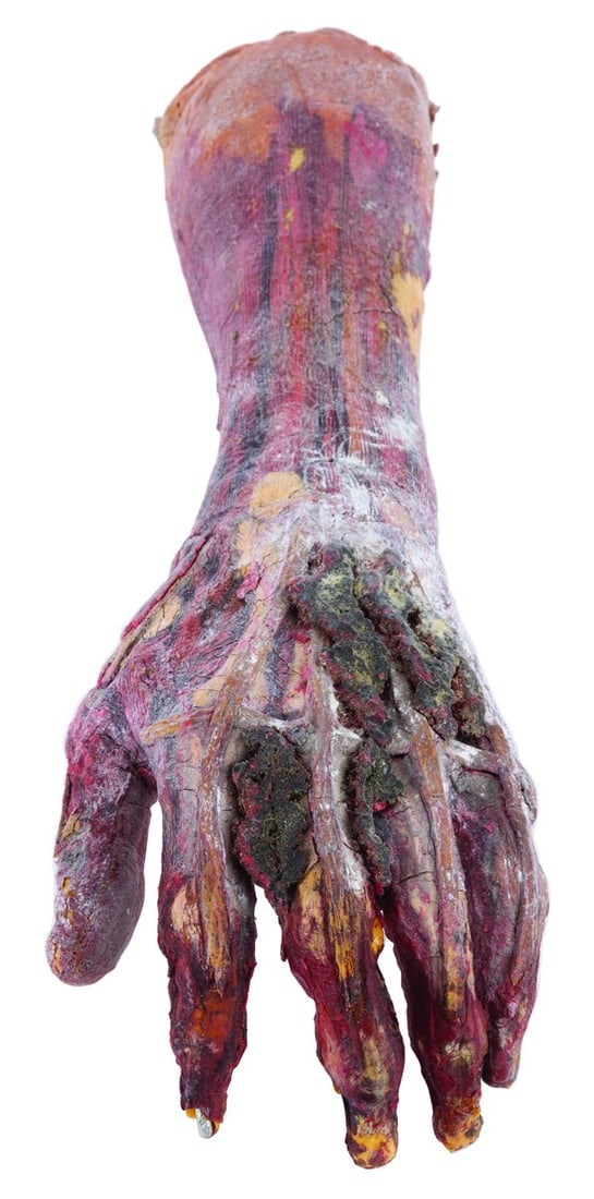 A “Darkman?? Burning Hand Stop-Motion Animation Prop.: (Universal Pictures, 1990) A stop-motion animation prop from Sam Raimi’s “Darkman,” created for a gruesome scene in which Dr. Westlake is tortured, with his hand's skin, muscle, and veins bu