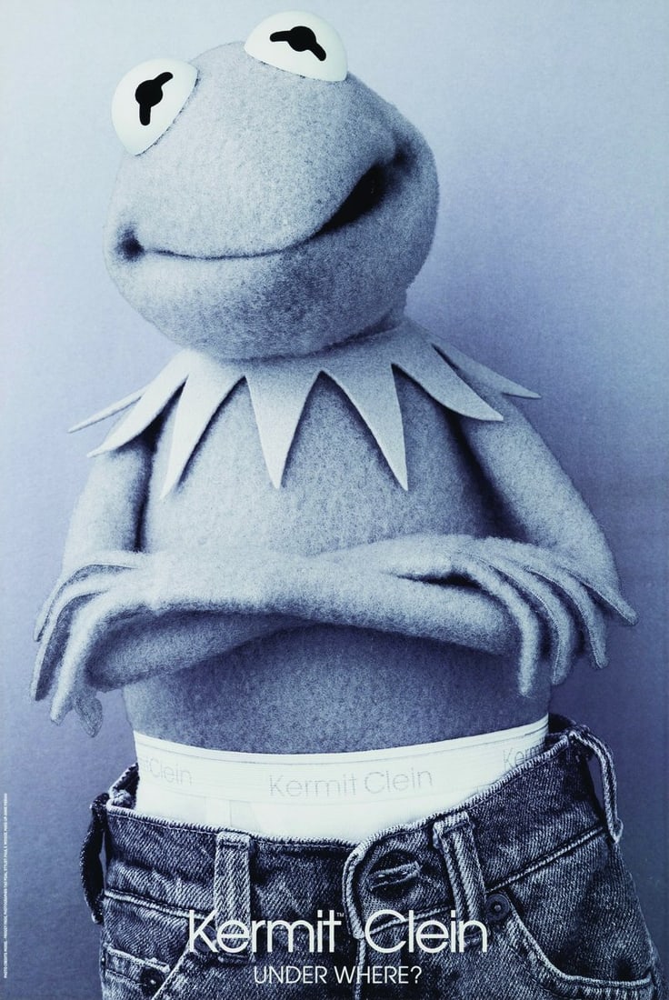 A Kermit the Frog Calvin Klein Spoof Poster.: (Day Dream Publishing, 1996) A framed poster of Kermit the Frog as Kermit Clein, parodying the Calvin Klein ads starring Mark Wahlberg. This image appeared in the calendar Kermit the Frog's 1996 Adver
