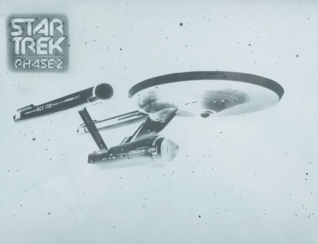 A Rare "Star Trek Phase 2" Negative.: (Paramount, 1970s) A rare Star Trek Phase II title art negative. As the popularity of the original 1966 Star Trek television series grew in syndication, Paramount began work on a sequel series titled