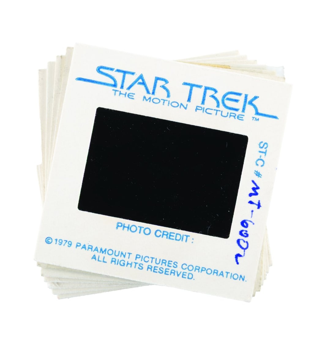 A Set of "Star Trek: The Motion Picture" Slides.: (Paramount, 1979) A collection of seven slides for "Star Trek: The Motion Picture." These slides unusually feature the custom-printed logo for the film on the mounts, and two have hand-written notes s