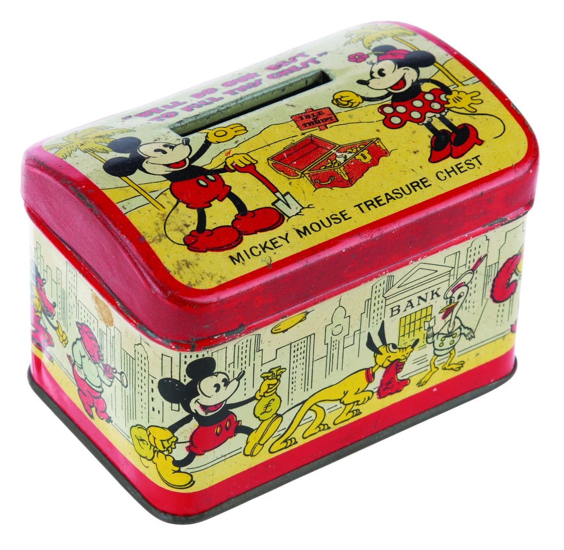 A Mickey Mouse Treasure Chest Tin Bank.: (Japan, 1930s) A tin litho Mickey Mouse treasure chest featuring early designs of Disney characters and the slogan "We'll do our best to fill this chest." This Japanese-made chest differs from the Ame