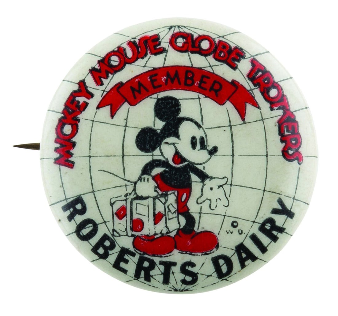 A Roberts Dairy Mickey Mouse Globe Trotters Button.: (Disney, 1930s) A rare Mickey Mouse Globe Trotters Member button, part of a grocery store promotion for Roberts Dairy. Measuring 1.25" in diameter, the button is in very good condition with light scra