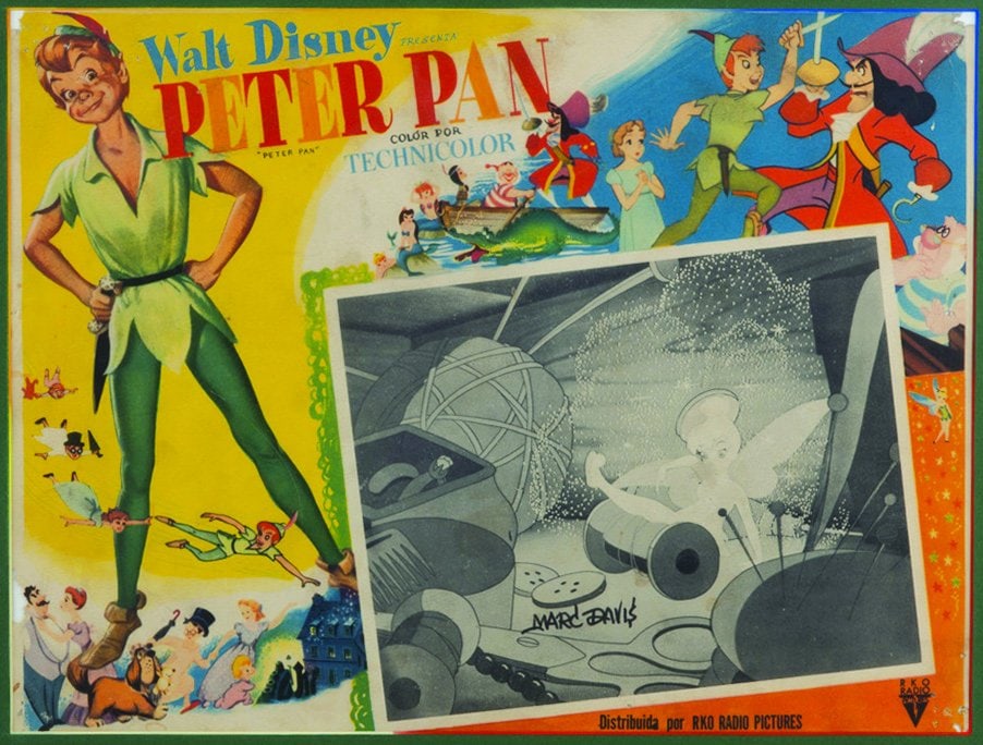 A Marc Davis Signed "Peter Pan" Spanish Lobby Card.: (Disney, 1953) A framed lobby card for the original Spanish release of Walt Disney's "Peter Pan" signed by Disney Legend Marc Davis, who created Tinker Bell. Measuring 12" x 16" visible in a 22" x 26"