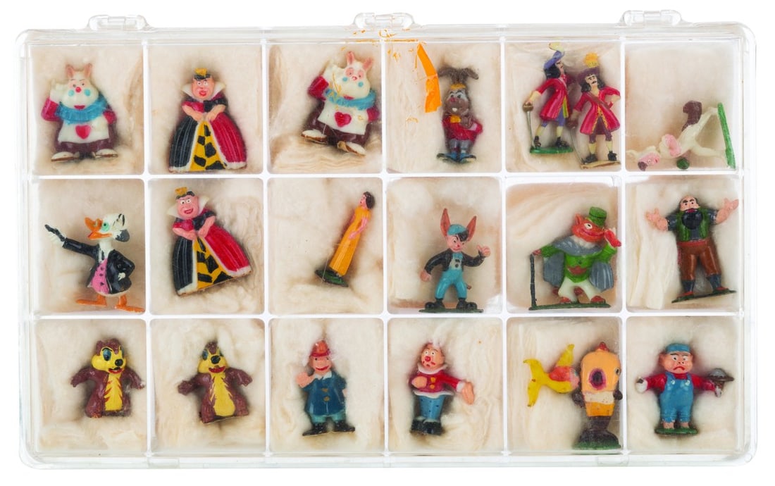 A Collection of Second Series Disneykins.: (Disney, 1961) A collection of twenty miniature figurines from Disneykins second series. Included are Ludwig Von Drake, the March Hare, Cleo, Regular Clown, Fireman Clown, Wendy, Lost Boy No. 1, Lampw