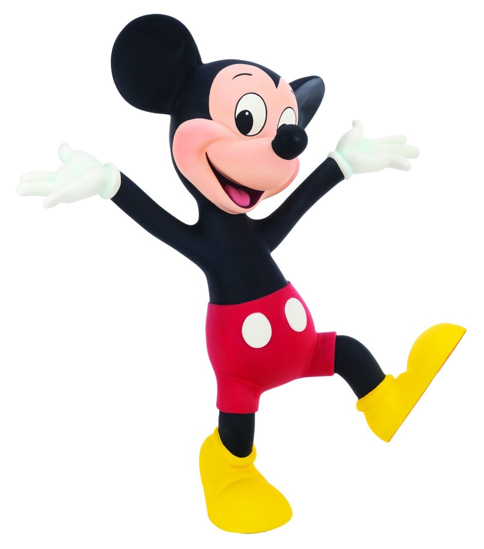 A Mickey Mouse Disney Store Display Figure.: (Disney, 1994) A Disney Store display figure of Mickey Mouse in his classic red shorts and yellow shoes. Measuring 25" x 11" x 29.5" tall, the fiberglass figure is in very good condition with light sc