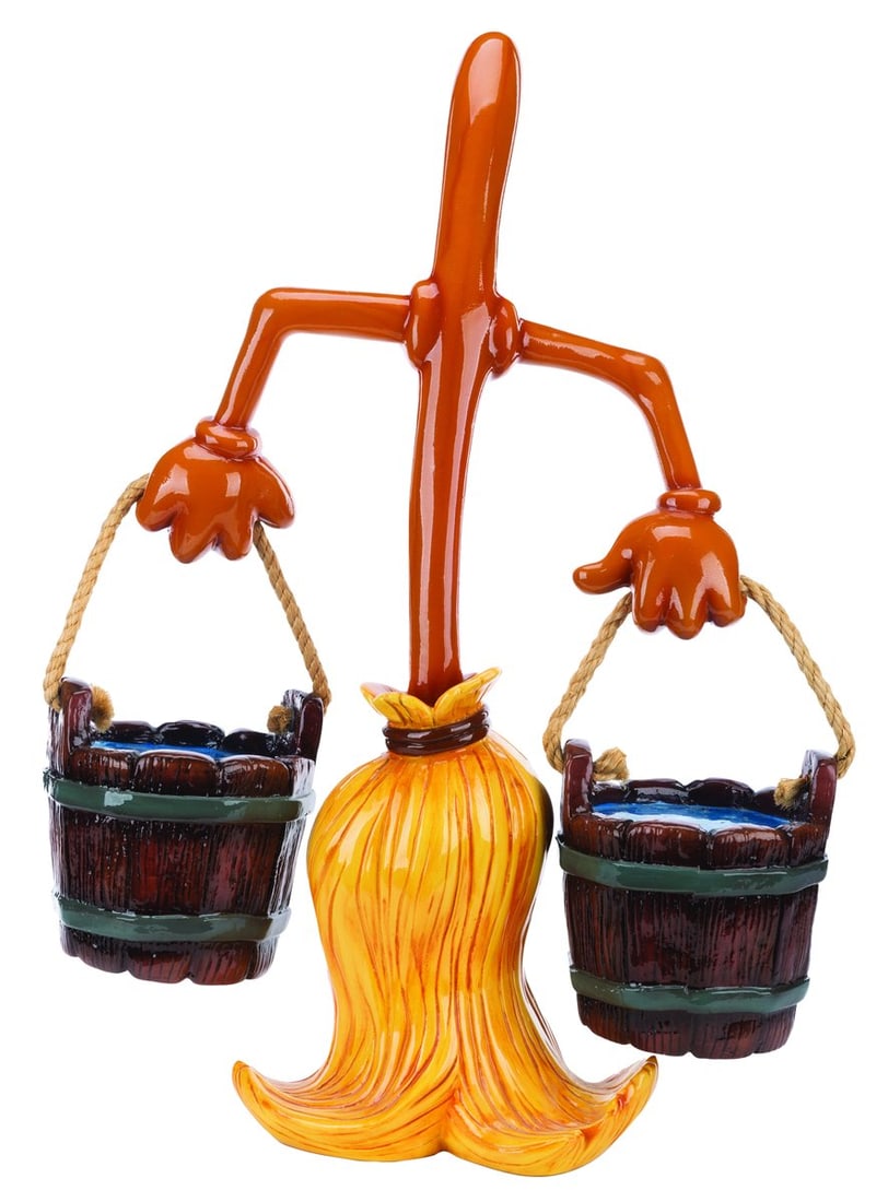 A Disney Store "Fantasia" Enchanted Broom Display Figure.: (Disney, 1990s-2000s) A Disney Store display figure of an enchanted broom with a pair of water buckets from the Sorcerer’s Apprentice segment of "Fantasia." Measuring 9" x 16" x 28" tall with 8" x 8