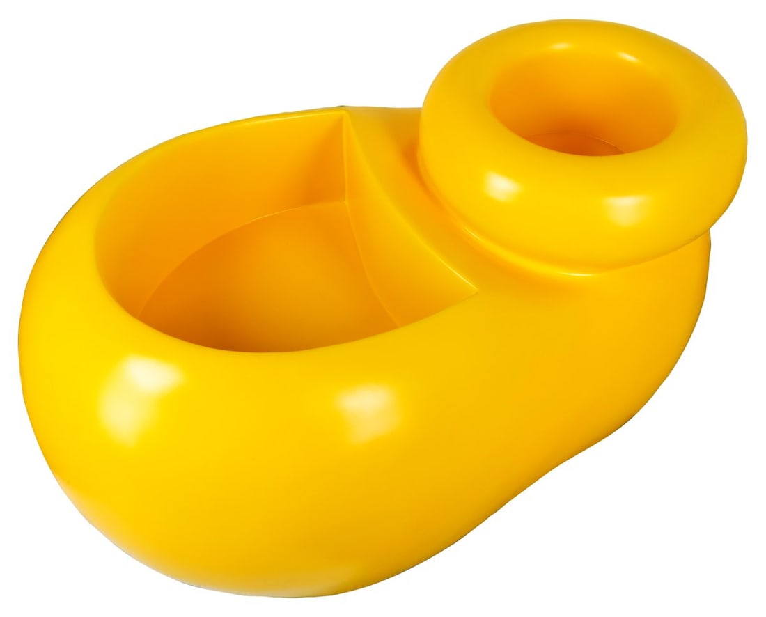 A Mickey Mouse Shoe Disney Store Display.: (Disney, 2005-2007) A Disney Store display in the shape of Mickey’s right shoe. The Disney Stores featured merchandise displays at the checkout counter in the form of Mickey's gloves, shoes and the