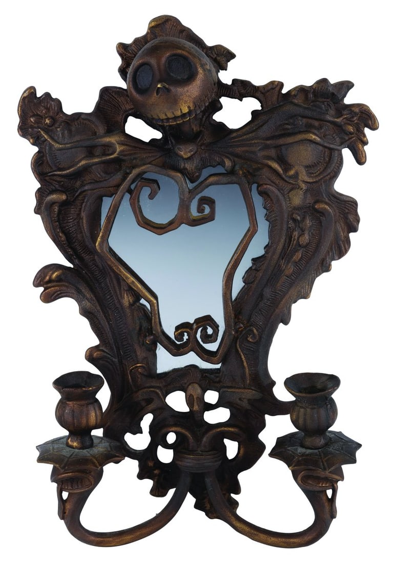 A Jack Skellington "What's This?" Wall Mirror.: (Disney, 2004) A Walt Disney Collectibles "What's This?" wall mirror featuring Jack Skellington from "The Nightmare Before Christmas." Designed by Jody Daily and Kevin Kidney, the mirror was released