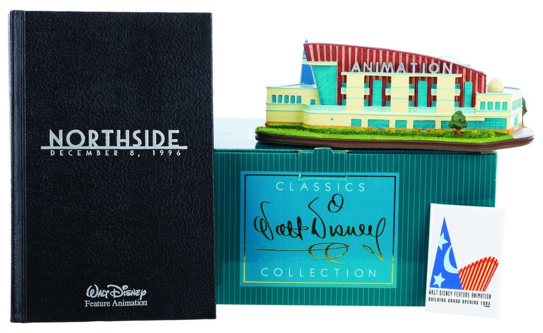 A Feature Animation Building Sculpture, Button, & Notebook.: (WDCC, 2002) A Walt Disney Classics Collection sculpture of the Feature Animation Building at Walt Disney Studios in Burbank. Titled “Where the Magic Begins,” the figurine was released in a li