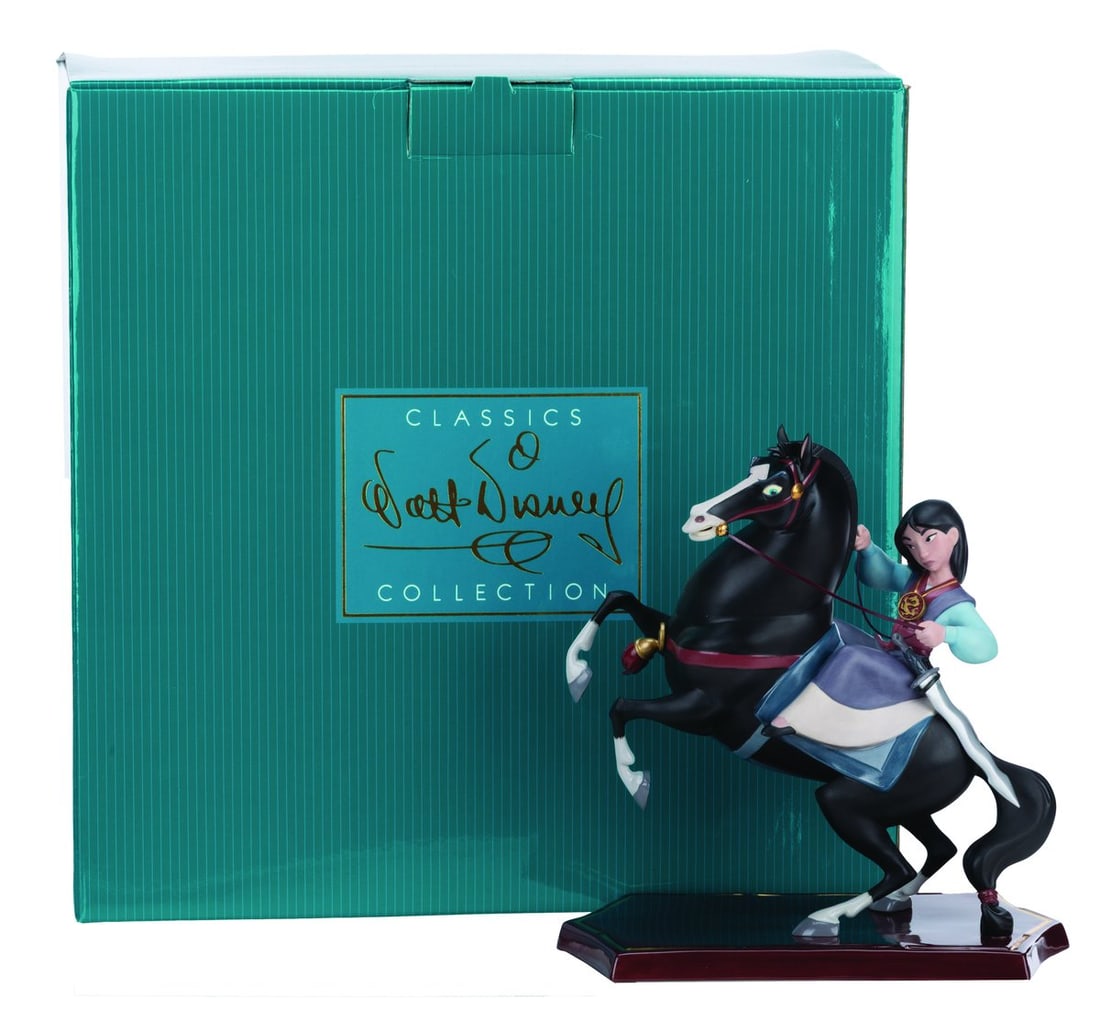 A WDCC Mulan and Khan “Triumphant?? Figurine.: (WDCC, 2003) A Walt Disney Classics Collection figurine of Mulan and Khan titled “Triumphant.” The figurine was sculpted by Dusty Horner and released as the first piece in the Heroes & Heroine
