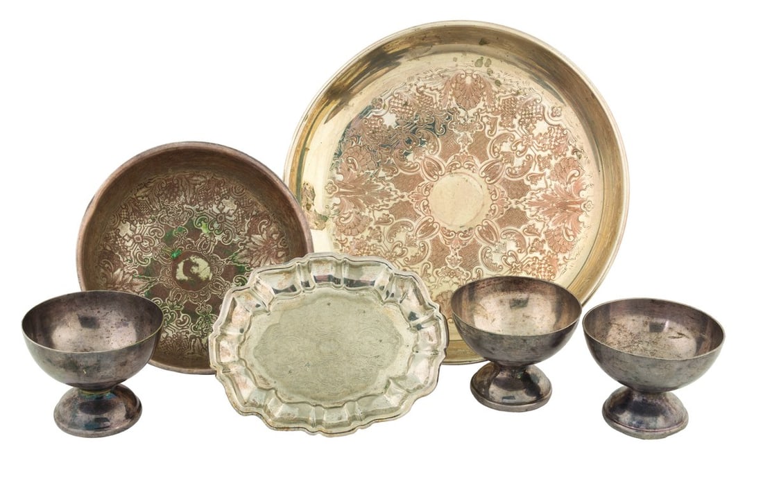 A Collection of "Pirates of the Caribbean" Treasure Props.: (Disney, 2003) A collection of six treasure props from the Isla de Muerta set of "Pirates of the Caribbean: The Curse of the Black Pearl," including three chalices and three serving platters. Ranging