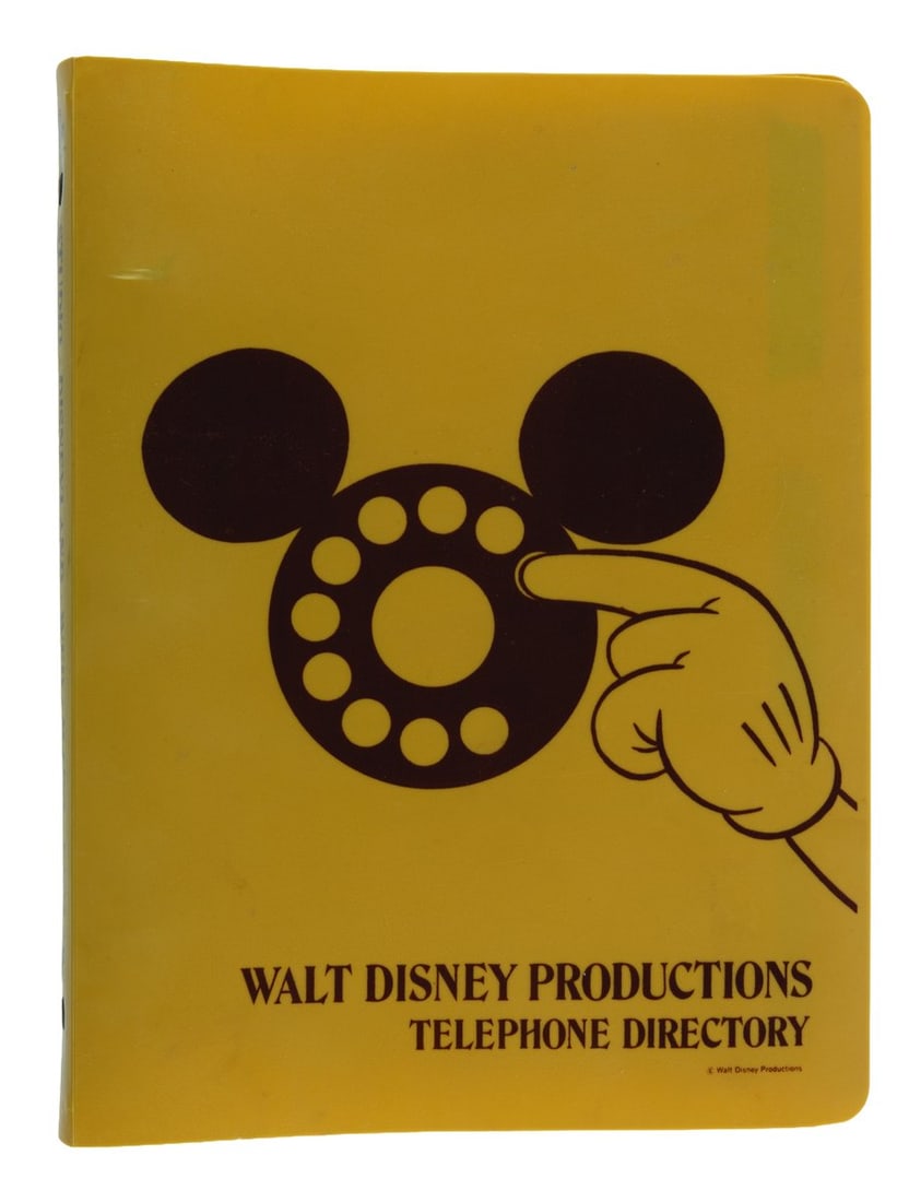 A Walt Disney Productions Telephone Directory.: (Disneyland, 1970s) A Walt Disney Productions telephone directory. The three-ring binder includes 71 numbered pages (and many unnumbered) of phone extensions, addresses, and other contact information