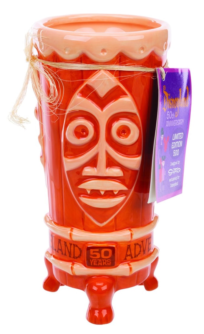 A SHAG Disneyland 50th Anniversary Tiki Mug.: (Disneyland, 2005) An Adventureland Tiki Mug created by the artist SHAG for the 50th anniversary of Disneyland. The mug is Limited to an edition of 500 and signed underneath by SHAG. Measuring 8" tall