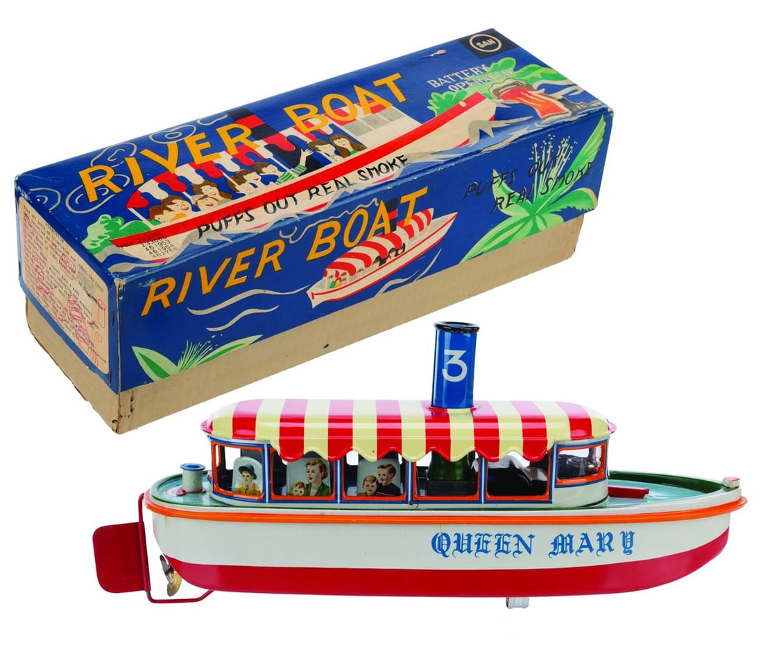 A Japanese Jungle Cruise-Inspired Tin River Boat.: (Marusan SAN, 1960s) A Japanese tin river boat toy inspired by the Jungle Cruise. While this is an unlicensed toy, the red and white awning and the imagery on the box clearly draw from the popular Dis