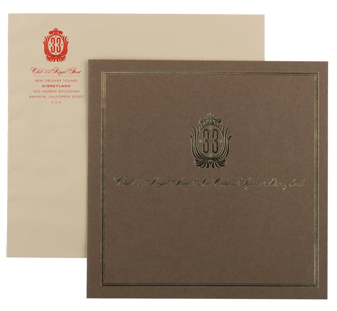 A Club 33 Brochure Cover and Envelope.: (Disneyland, 1967) A rare Club 33 brochure cover and envelope from the early years of the exclusive New Orleans Square restaurant. Club 33 used these types of materials to invite special individuals a