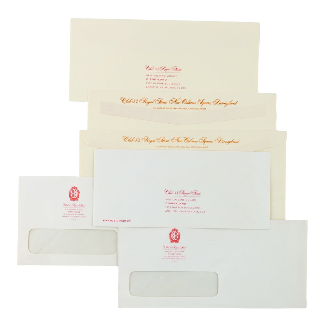 A Club 33 Envelope Collection.: (Disneyland, 1960s-70s) A collection of six Club 33 mailing envelopes, including two standard, two windowed, one large, and one for a finance director. Ranging in size from 4.25" x 9.5" to 4.5" x 10.5