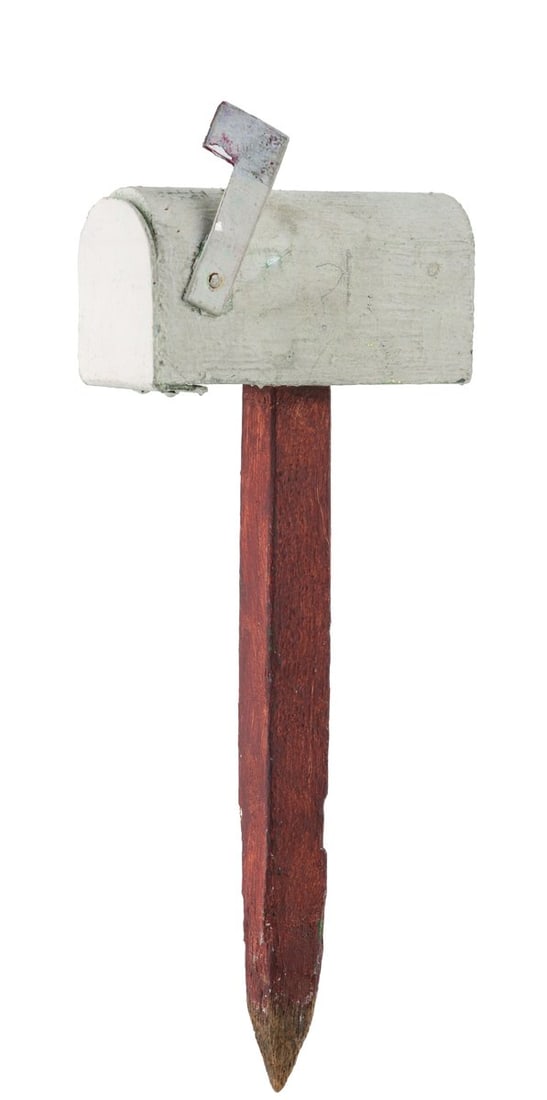 A Storybook Land Canal Boats Prop Mailbox.: (Disneyland, 1970s-90s) A prop mailbox from outside of the White Rabbit's hole from the "Alice in Wonderland" section of the Storybook Land Canal Boats. The mailbox has a hinged flag, and the faint ou