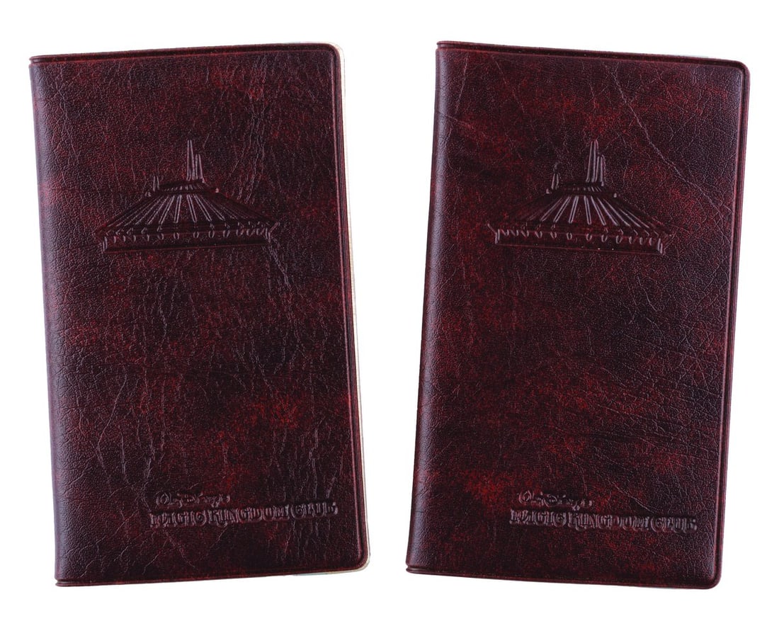 A Pair of Space Mountain Magic Kingdom Club Almanacs.: (Disney Parks, 1977) A pair of 1977 Walt Disney's Magic Kingdom Club almanacs featuring Space Mountain's exterior on the cover. The almanac contains a calendar and travel information for Disneyland an