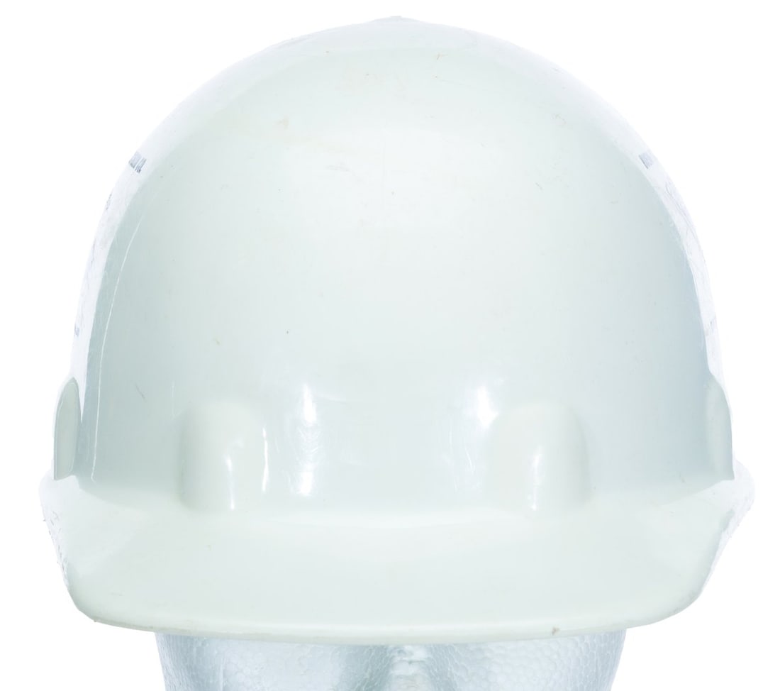 A Buena Vista Construction Hard Hat.: (Walt Disney World, 1970s) A hard hat worn by construction workers building and maintaining Walt Disney World. Unlabeled, the hard hat displays in good condition with typical scratches, stains, and we