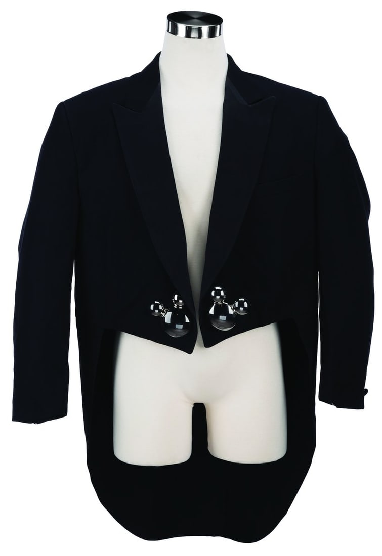 A Mickey Mania Parade Cast Member Blazer.: (Walt Disney World, 1994-96) A Mickey Mouse-style costume blazer with coattails and large Mickey head buttons worn by performers in the Mickey Mania Parade, which ran at the Magic Kingdom from 1994 to