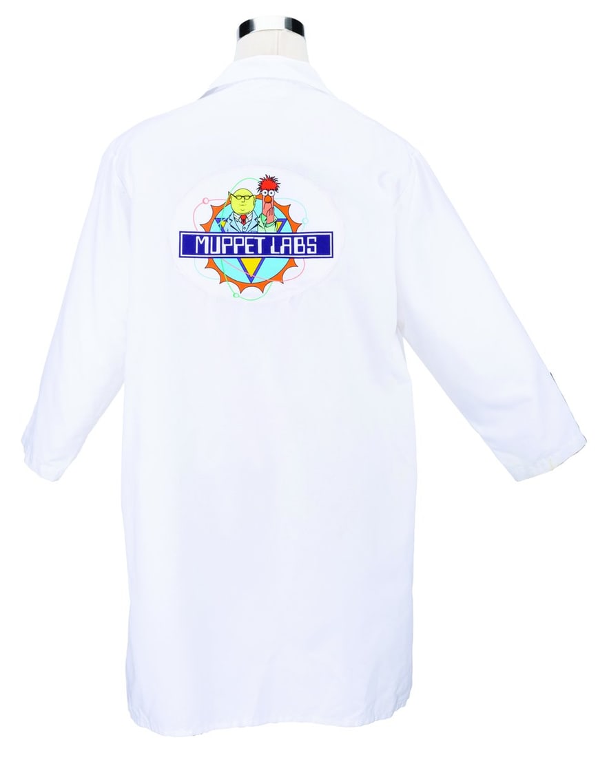 A Muppet*Vision 3D Cast Member Lab Coat.: (Disney-MGM Studios, 2000s) A Muppet Labs coat worn by Cast Members working Muppet*Vision 3D at Disney-MGM Studios. Labeled a size 46, the lab coat is in very good condition with light stains and wear
