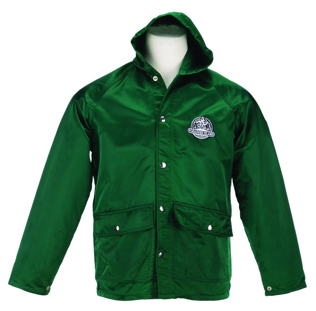 A Pleasure Island Satin Jacket.: (Pleasure Island, 1989) A green satin jacket worn by Cast Members at Pleasure Island. Labeled a size M, the jacket is in good condition with stains, scratches, and wear.