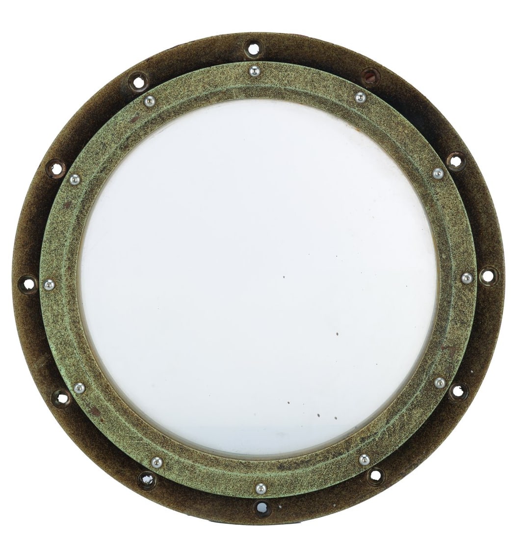 A Magic Kingdom 20,000 Leagues Nautilus Porthole.: (Walt Disney World, 1970s-90s) A porthole from one of the Nautilus submarines in the Magic Kingdom's 20,000 Leagues Under the Sea: Submarine Voyage attraction. From 1971 until 1996, Guests viewed the