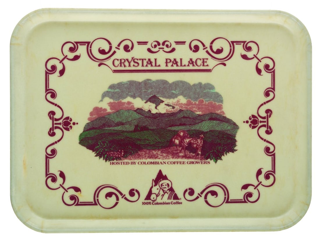 A Magic Kingdom Crystal Palace Tray.: (Walt Disney World, 1980s-90s) A tray from the Crystal Palace restaurant in the Magic Kingdom, sponsored by Colombian Coffee Growers. Measuring 15" x 20.25", the tray is in good condition with scratch