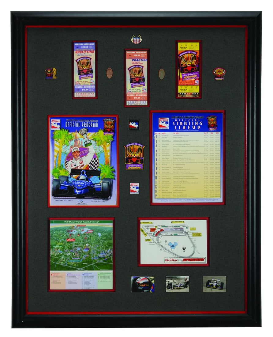A Walt Disney World Speedway Indy 200 Framed Set.: (Walt Disney World, 1999) A large collection of 18 items from the Indy 200 racing league event at the Walt Disney World Speedway. This framed set includes tickets, pins, programs, maps, flattened penn