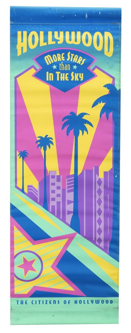 A Disney-MGM Studios Double-Sided Hollywood Banner.: (Disney-MGM Studios, 1990s-2000s) A double-sided vinyl banner originally displayed at Disney-MGM Studios, promoting the glitz and glamour of Hollywood and the Citizens of Hollywood street performers.